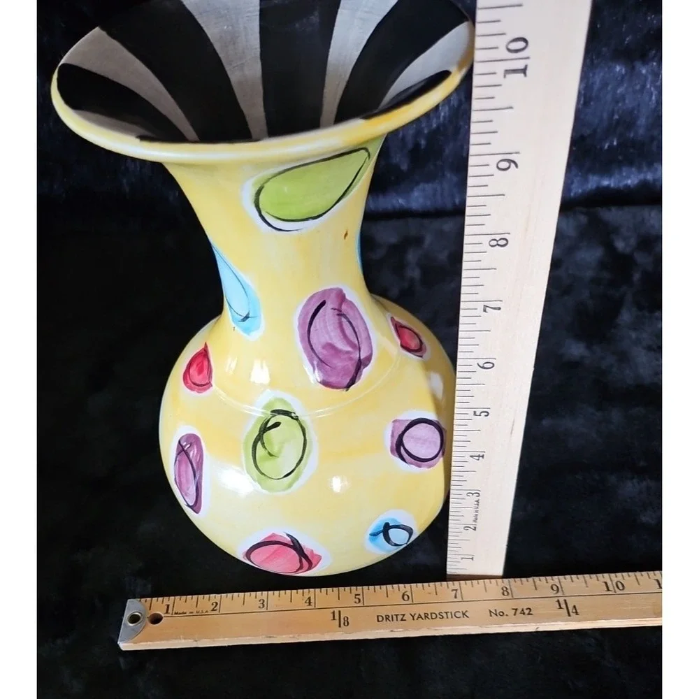 Yellow Vase with lots of color, Black/white inside Signed Thompson